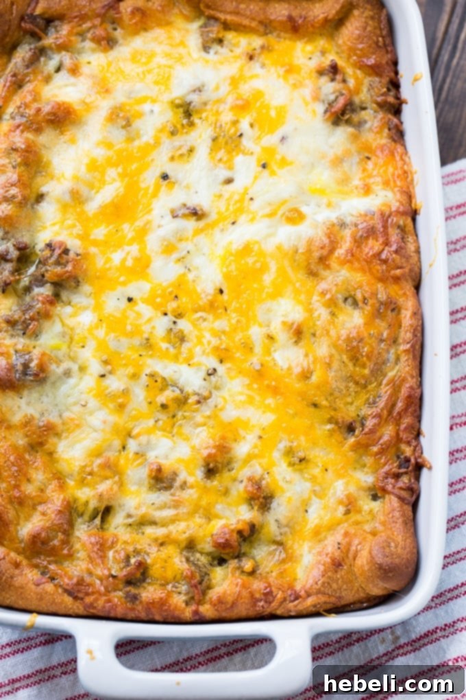 Sausage Crescent Bake 3 Close-up of baked Sausage and Crescent Roll Casserole showing a golden crust and bubbly cheese