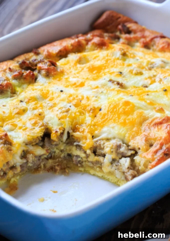 Sausage Crescent Bake 5 Sliced Sausage and Crescent Roll Casserole squares on a serving platter, ready to eat