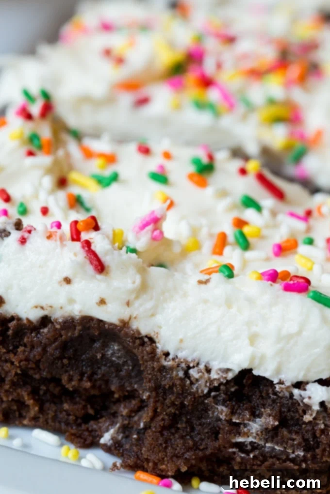Celebration Brownies with buttercream frosting and colorful sprinkles
