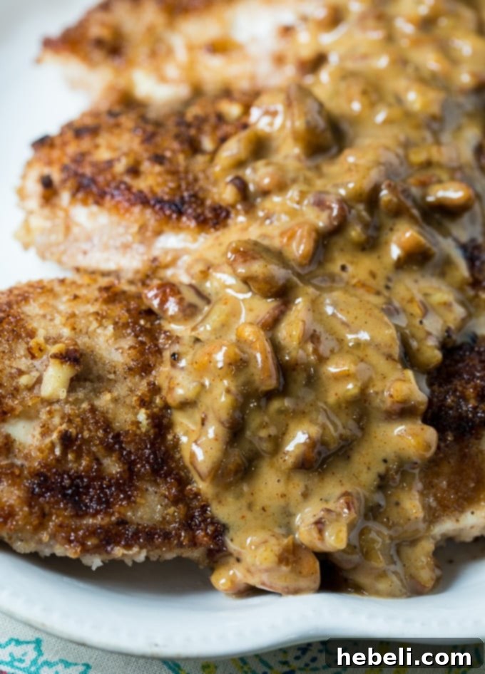 Glazed Bourbon Pecan Chicken 4 Pecan coated chicken in a creamy bourbon sauce.