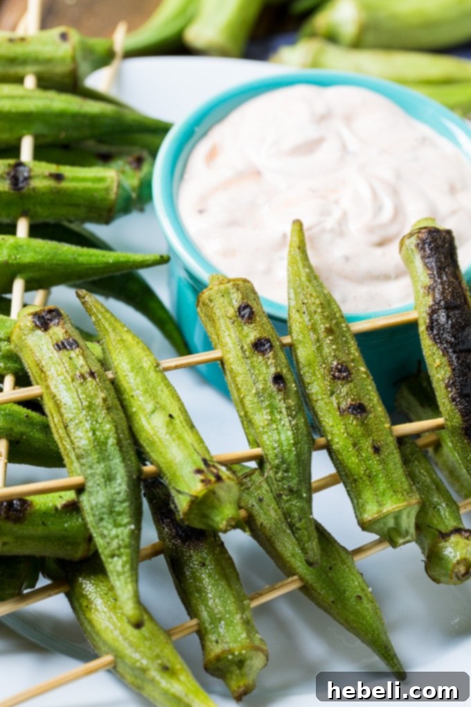 Smoky Chipotle Grilled Okra 4 Close-up of grilled okra pods with visible char marks.