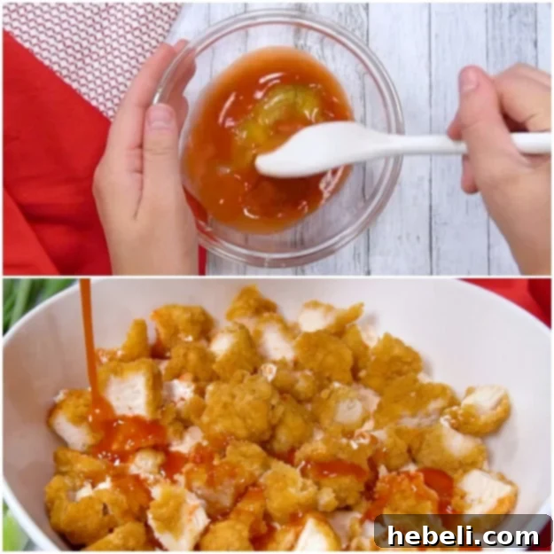 Drizzling the spicy hot sauce and honey mixture over the chicken in the dip.