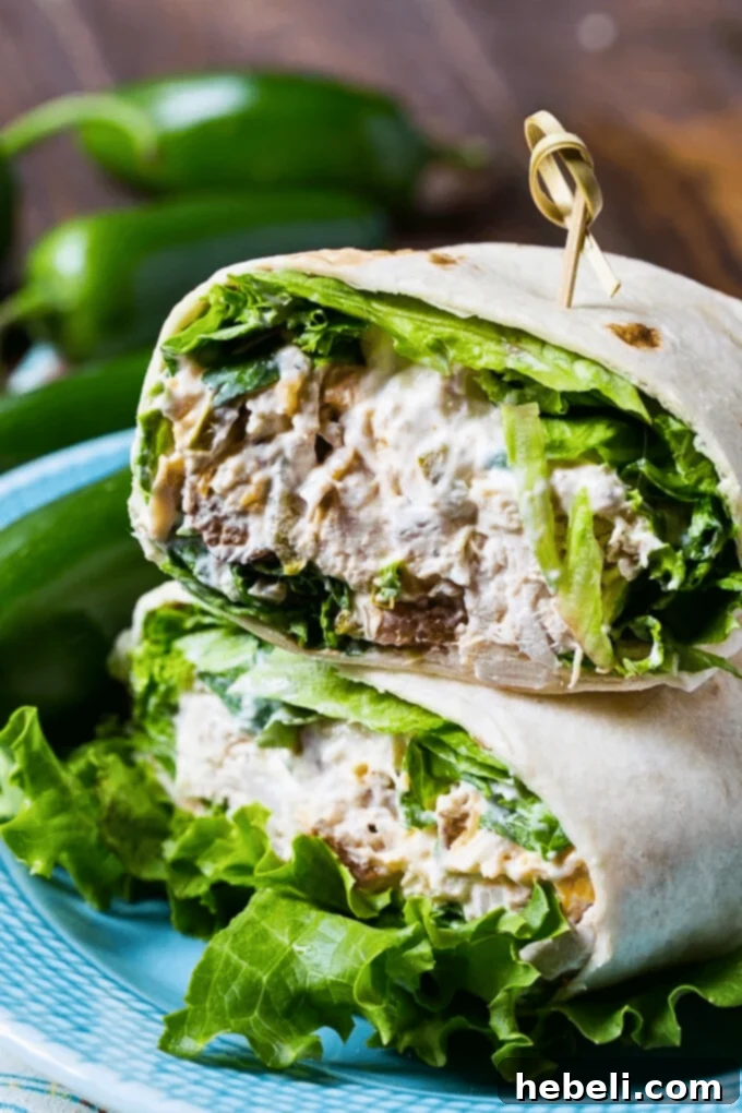 Loaded Jalapeno Popper Chicken Salad 4 Jalapeno Popper Chicken Salad served in a fresh lettuce wrap, highlighting its versatility.