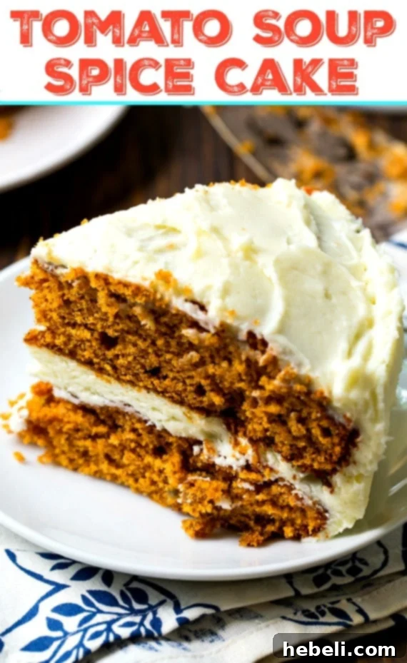 Finished Tomato Soup Spice Cake with cream cheese frosting, garnished