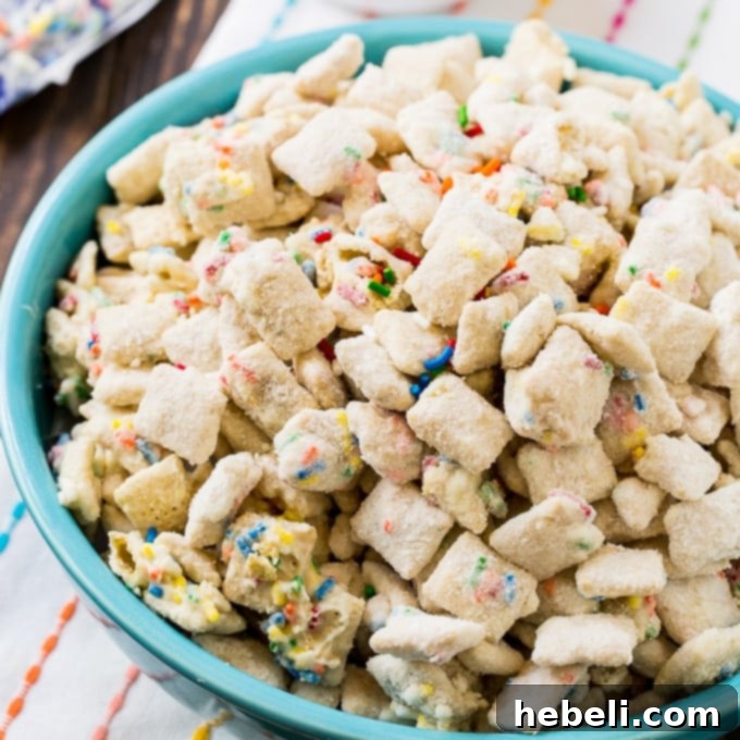 Cake Batter Muddy Buddies with colorful sprinkles