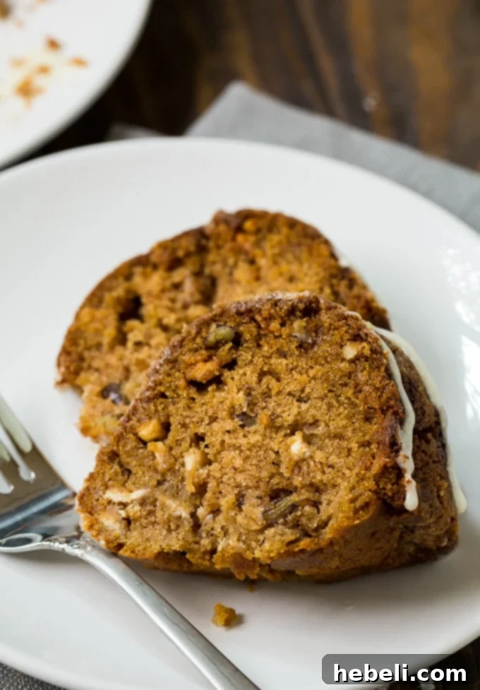 Moist Cinnamon Caramel Applesauce Coffee Cake with powdered sugar glaze