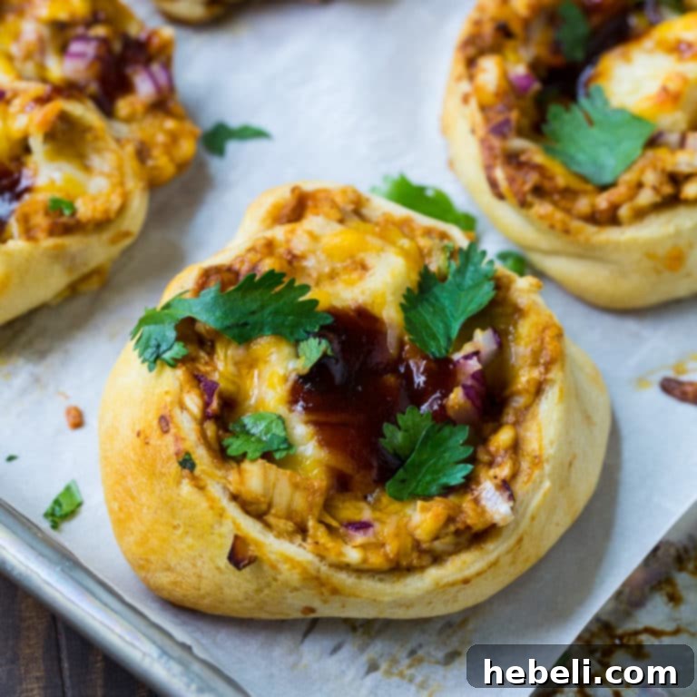 Delicious BBQ Chicken Crescent Pinwheels arranged on a serving platter, perfect for a game day snack or party appetizer.