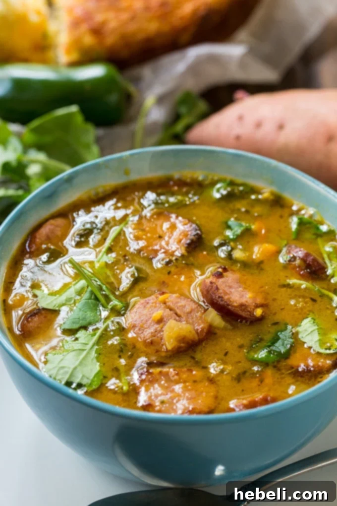 Close-up of Sausage and Sweet Potato Soup, showcasing its rich texture and ingredients