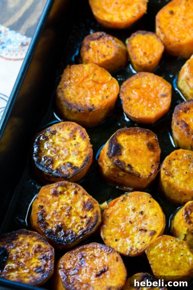 Melt-in-Your-Mouth Sweet Potatoes 3 Close-up of Melting Sweet Potatoes, showing their tender texture and caramelized edges.
