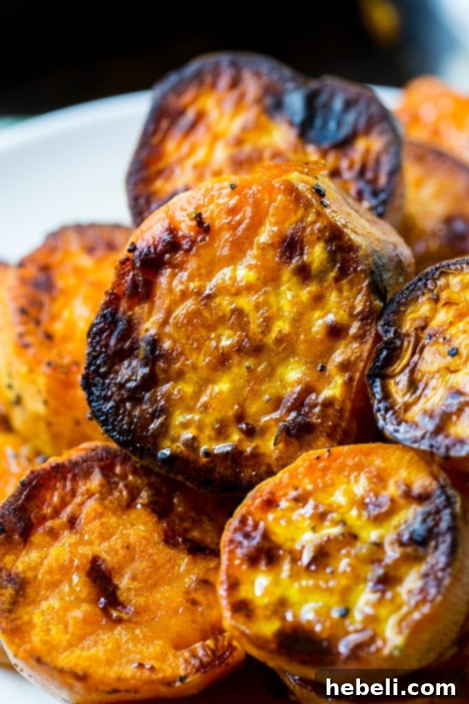 Melt-in-Your-Mouth Sweet Potatoes 4 A serving of Melting Sweet Potatoes on a plate, garnished and ready.