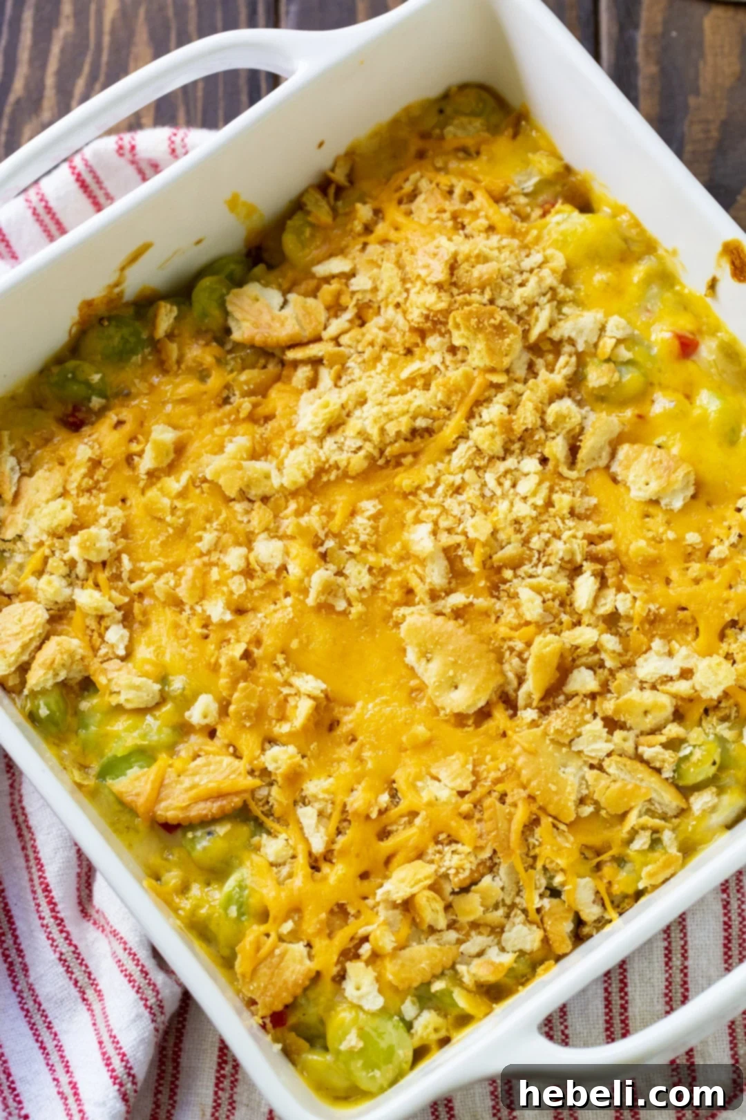 Hearty Lima Bean Bake 3 Close-up of Lima Bean Casserole showing the golden cheddar cheese and crushed Ritz cracker topping.