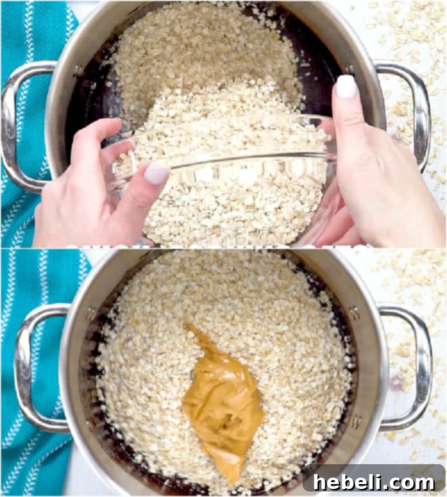 Quick-cooking oats and creamy peanut butter being stirred into the warm chocolate mixture.