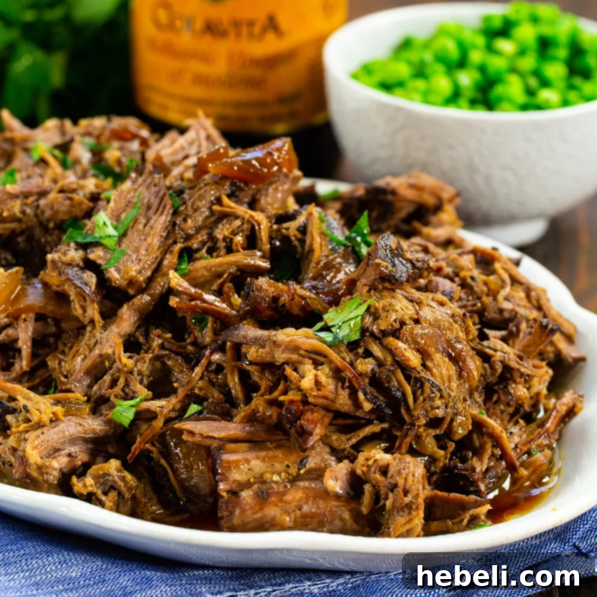 Crock Pot Balsamic Roast Beef on a serving plate.