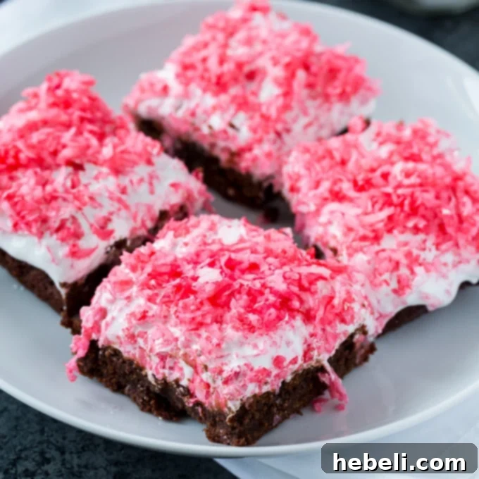 Pink Coconut Marshmallow Brownies 2 Sno Ball Brownies with marshmallow and coconut frosting