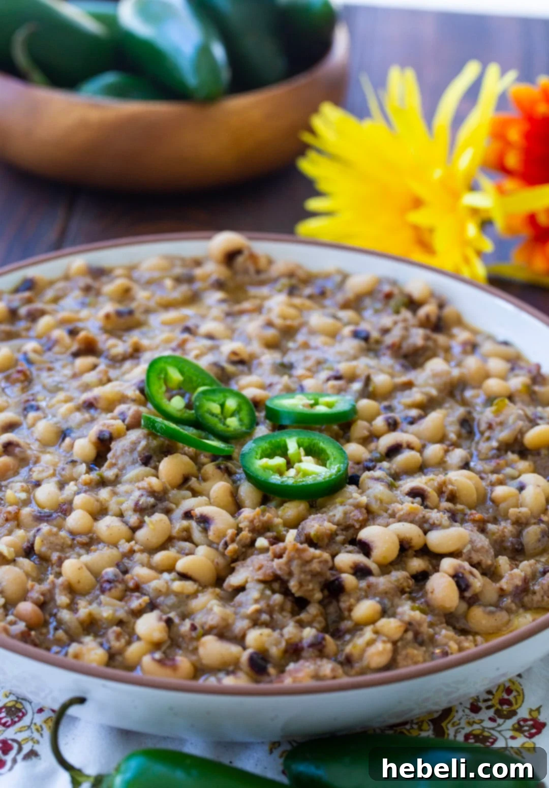 Zesty Black-Eyed Peas 4 A serving bowl filled with Black-Eyed Peas with Jalapeno, garnished and ready to be enjoyed.