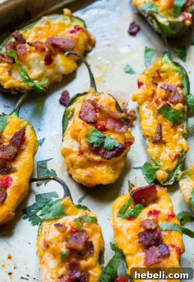 Spicy Pimento Cheese Poppers 3 Pimento Cheese Stuffed Jalapenos - A spicy, cheesy appetizer with a Southern twist.