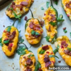 Spicy Pimento Cheese Poppers 5 Pimento Cheese Stuffed Jalapenos, freshly baked and ready to serve.