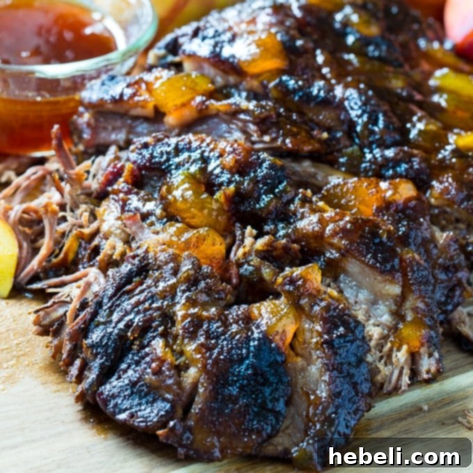 Slow-Roasted Beef Brisket with Bourbon Peach Glaze 2 Juicy Oven Roasted Brisket with glistening Bourbon Peach Glaze, sliced and ready to serve