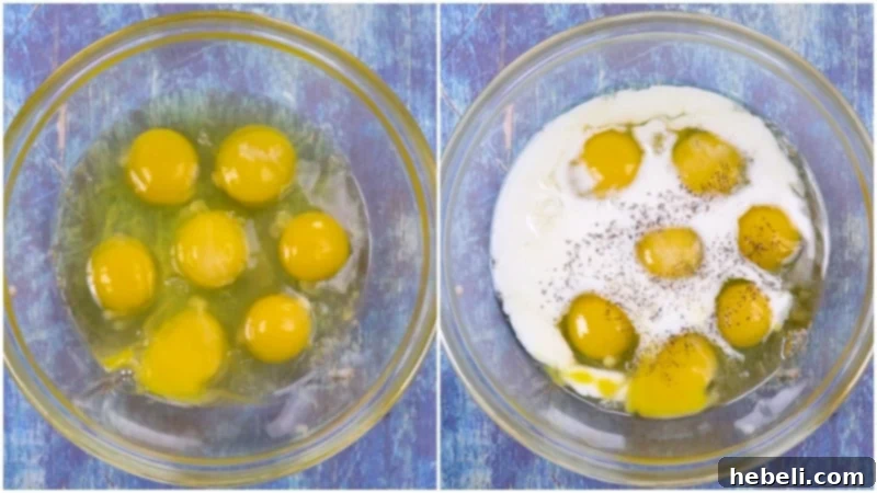 Egg and milk mixture being whisked together in a glass bowl, ready for the casserole layers.