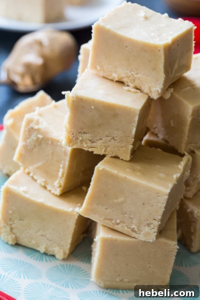 Close-up image of creamy Peanut Butter Fudge squares, showcasing their perfectly smooth and inviting texture