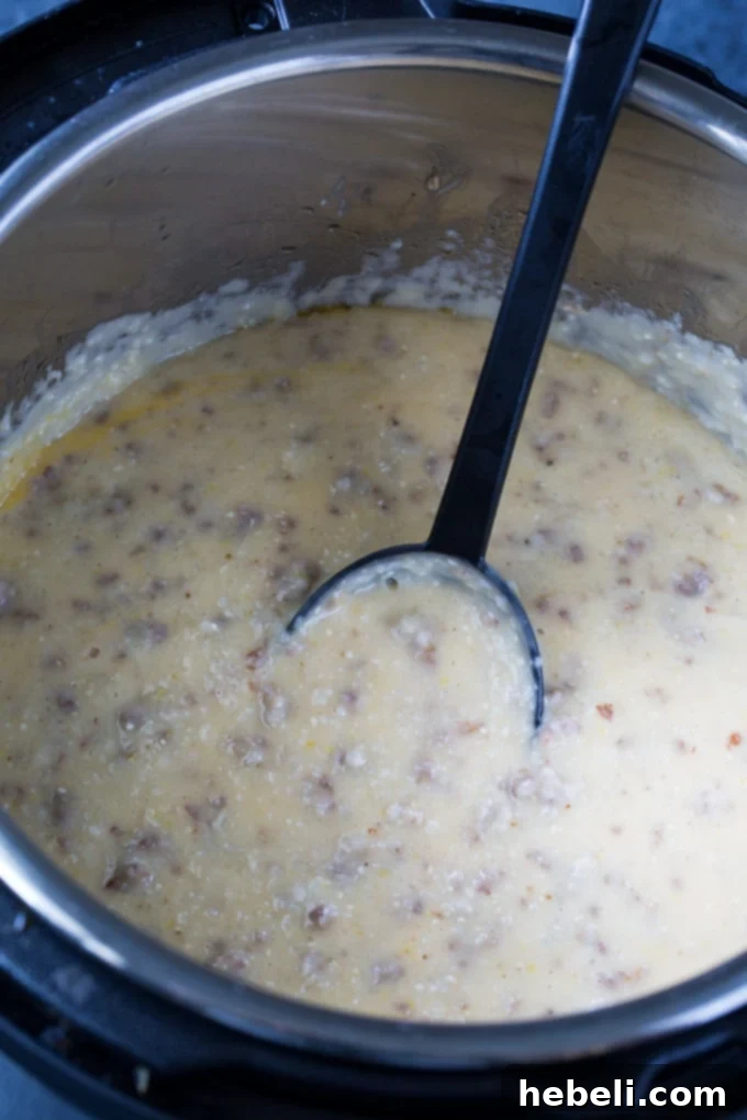 Instant Pot Sausage Grits, a hearty Southern breakfast dish featuring creamy grits and savory sausage