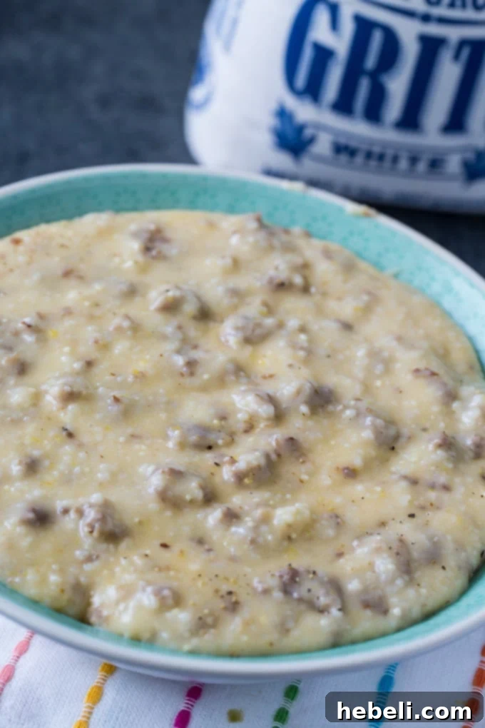 Close-up of browned breakfast sausage in an Instant Pot, ready for grits