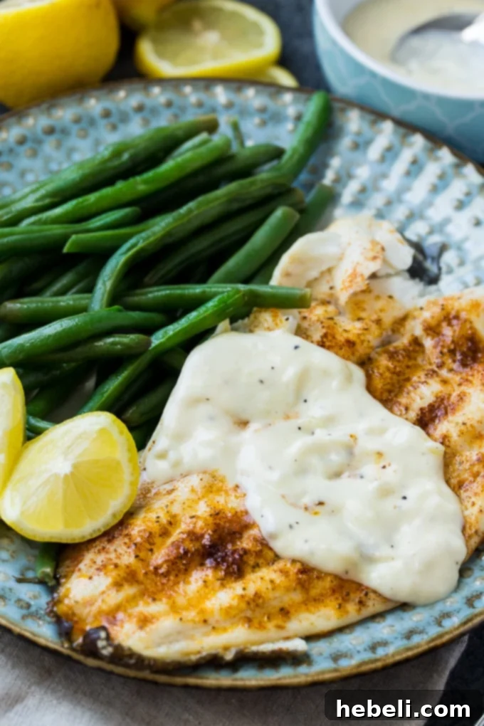 Broiled Flounder with Zesty Lemon Cream 4 Broiled Flounder with Lemon Cream Sauce close-up