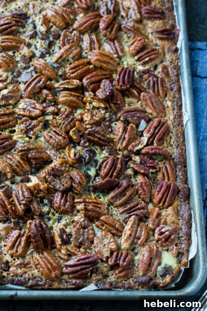 Chocolate Pecan Slab Pie in a large rectangular pan, ready for baking