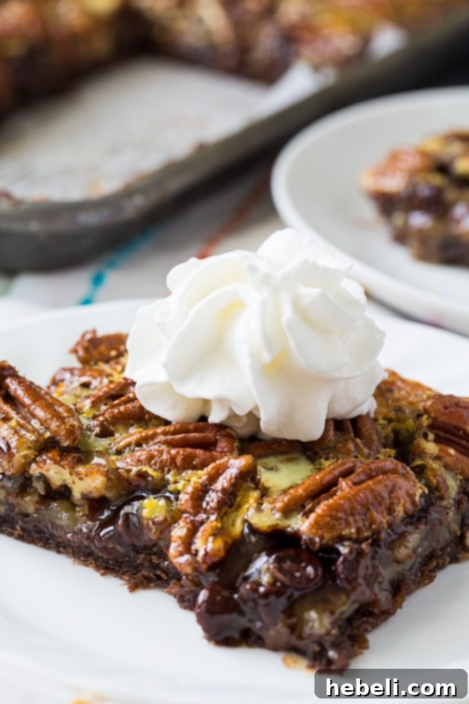 Chocolate Pecan Slab Pie with chocolate crust, beautifully sliced and ready to serve