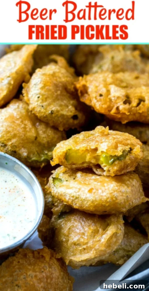 Close-up of fried pickles with dipping sauce.