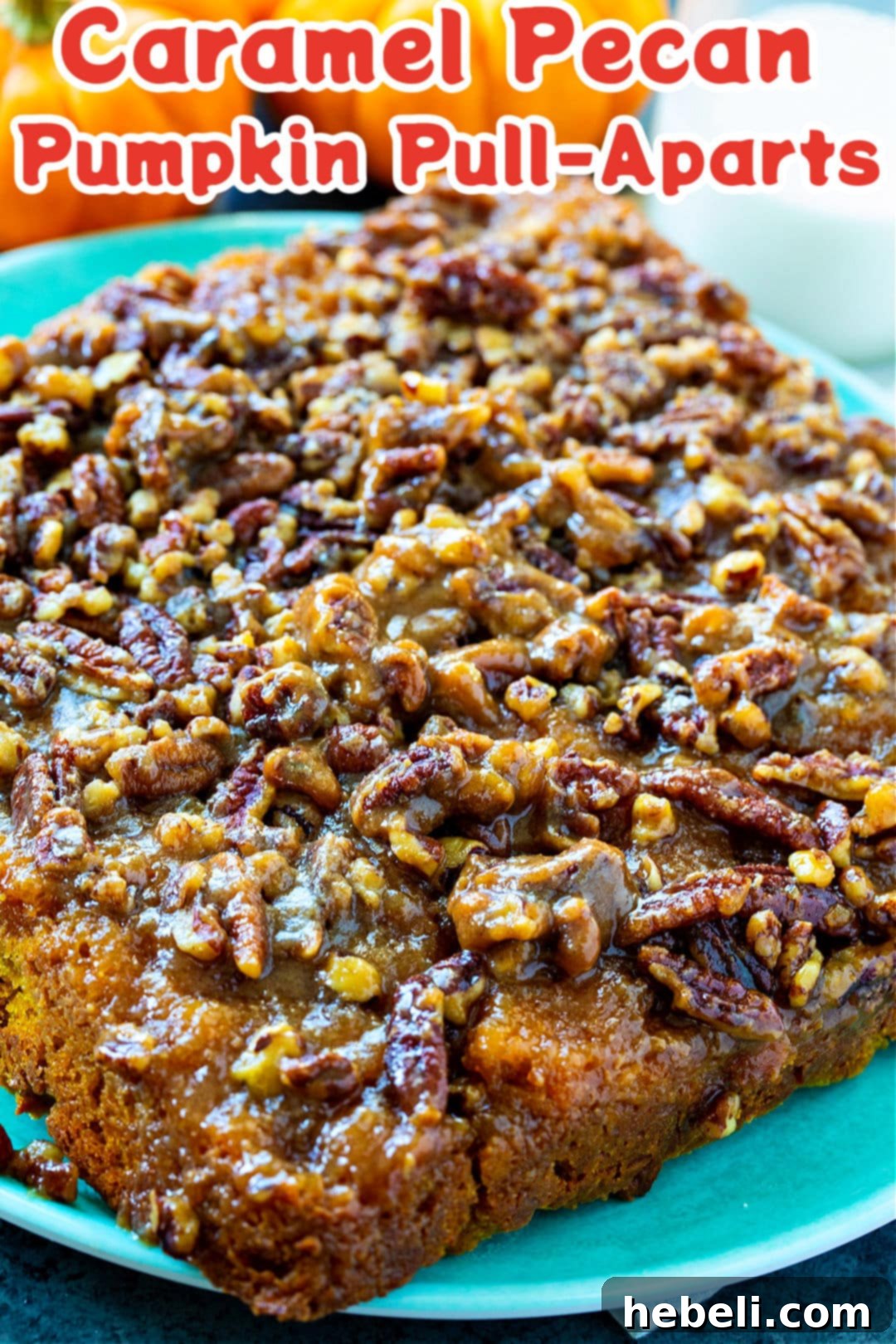 Warm Caramel Pecan Pumpkin Pull-Aparts fresh from the oven, ready to be served on a plate.