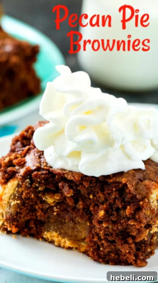 Delicious Pecan Pie Brownie slice topped with a swirl of fresh whipped cream, ready to be enjoyed as a decadent dessert.