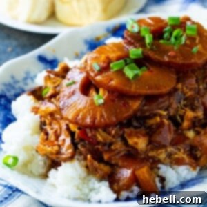 Tropical Sticky Slow Cooker Chicken 6 Crock Pot Sticky Hawaiian Chicken ready to serve.