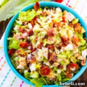 Chopped Cobb Salad in a bright blue bowl.