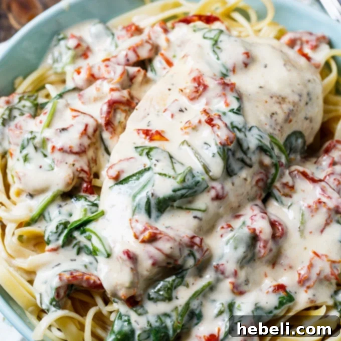 Effortless Slow Cooker Feasts 3 Slow Cooker Creamy Tuscan Chicken - A rich and creamy crockpot meal with sun-dried tomatoes and spinach.
