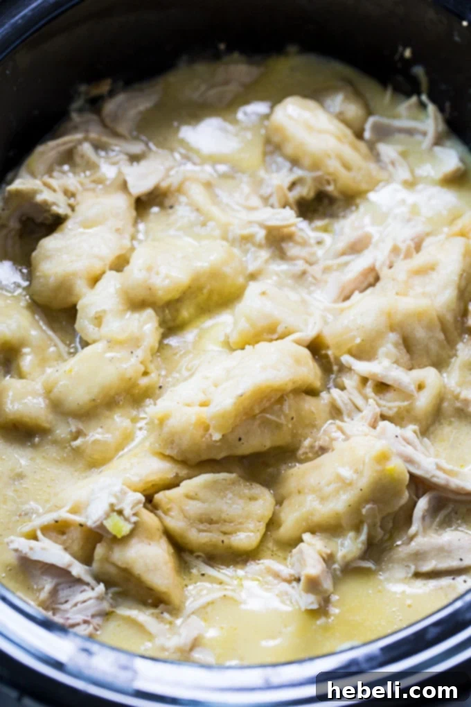 Creamy sauce and chicken in a slow cooker