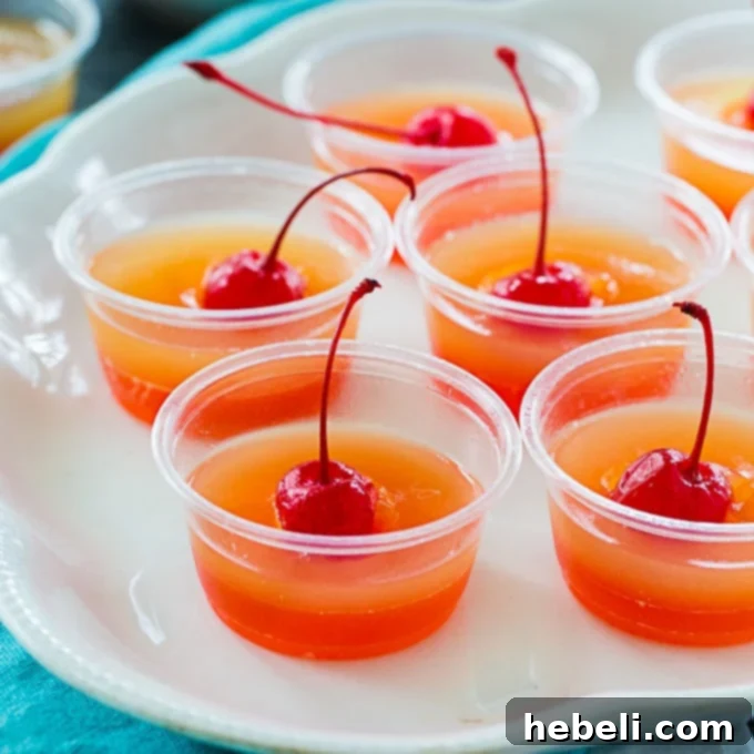 Caramelized Pineapple Cake Jell-O Shots 2 Delicious Pineapple Upside Down Jello Shots, perfect for summer parties and adult gatherings