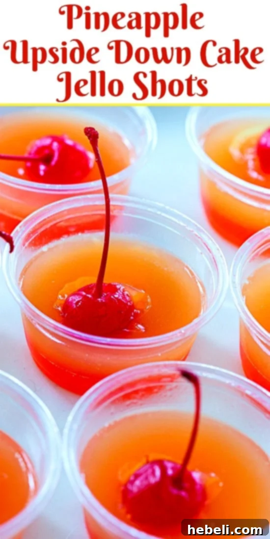 Caramelized Pineapple Cake Jell-O Shots 7 Two-layered Pineapple Upside Down Cake Jello Shots in plastic cups, showing the clear layers and cherry.