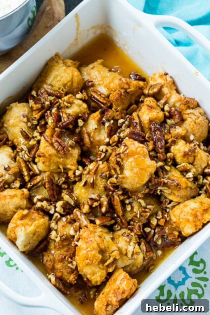 Honey Glazed Pecan Chicken 3 Close-up of golden-brown Honey Pecan Chicken pieces, glistening with sauce.