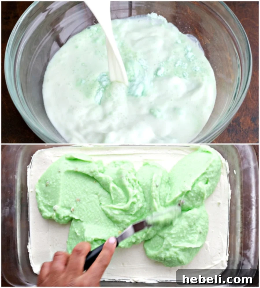 Pistachio pudding mixture being mixed and then spread evenly over the cream cheese layer