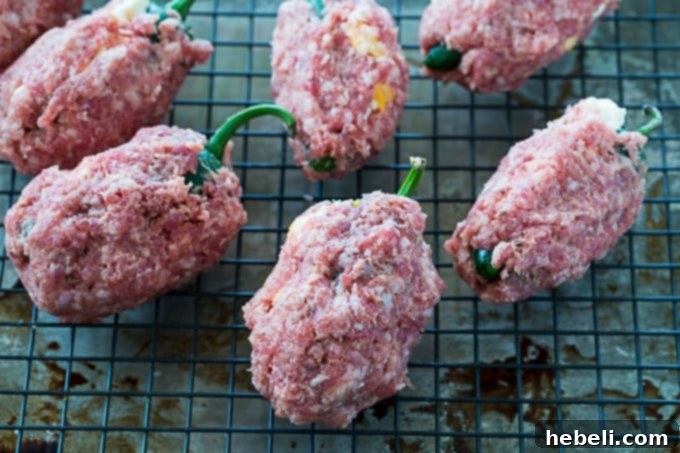 Wrap the jalapenos in with sausage.