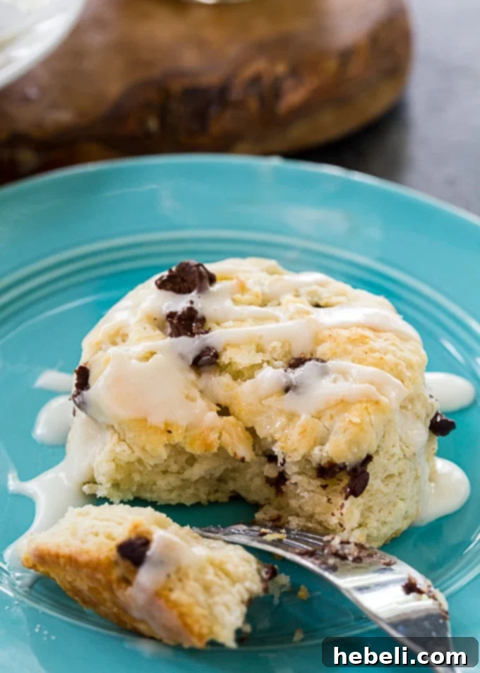 Irresistible Choc-Chip Delights 4 A stack of chocolate chip biscuits generously coated with sweet glaze.