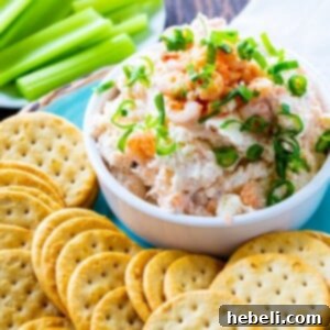 Easy Shrimp Spread in a bowl surrounded by crackers.