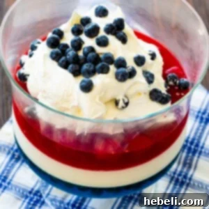 Red, White & Blue Jello Salad in a trifle bowl.