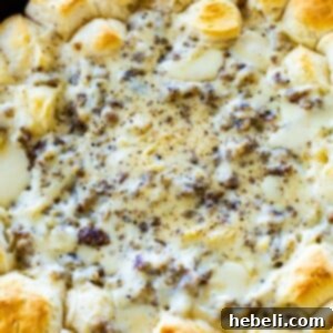 Biscuits and Gravy Ring in a cast iron pan.