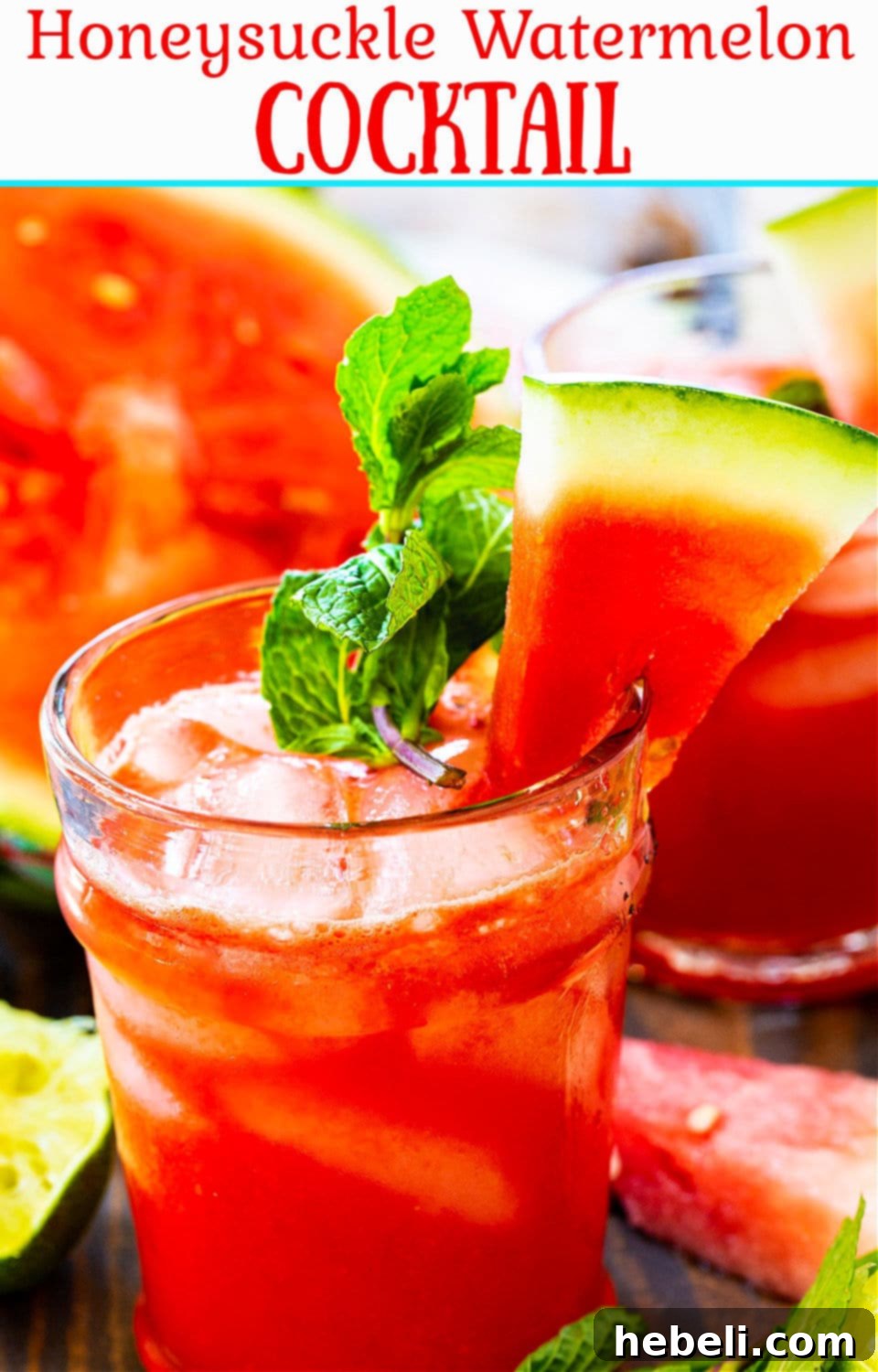A large, inviting pitcher of Honeysuckle Watermelon Cocktail with several garnished glasses and fresh watermelon slices, perfect for sharing at a summer gathering.
