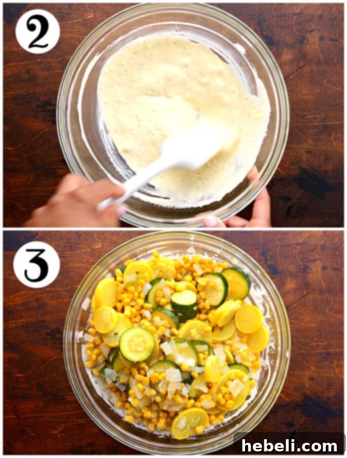 A large mixing bowl containing mayonnaise, sour cream, eggs, melted butter, salt, pepper, and shredded cheddar cheese, being stirred together.