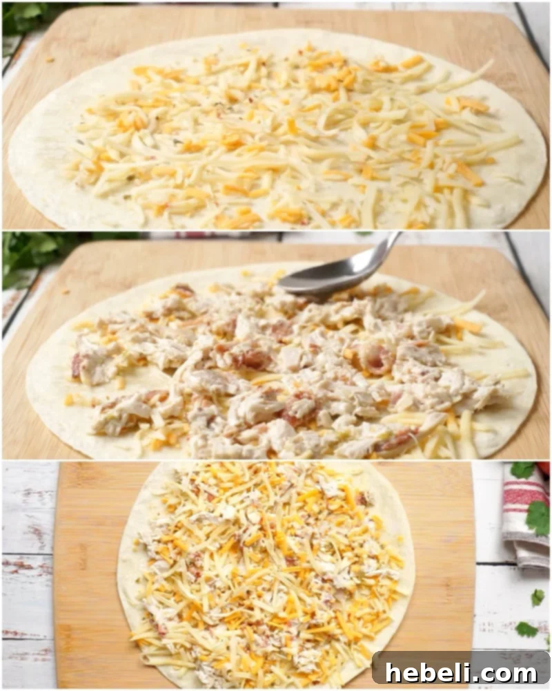 A quesadilla being assembled on a flat surface, showing a tortilla topped with cheese, chicken-bacon-ranch filling, and more cheese.