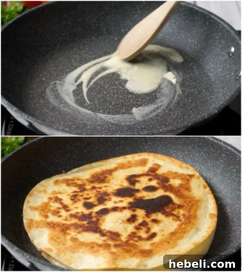 A Chicken, Bacon and Ranch Quesadilla being pan-fried in a skillet, turning golden brown and crispy.