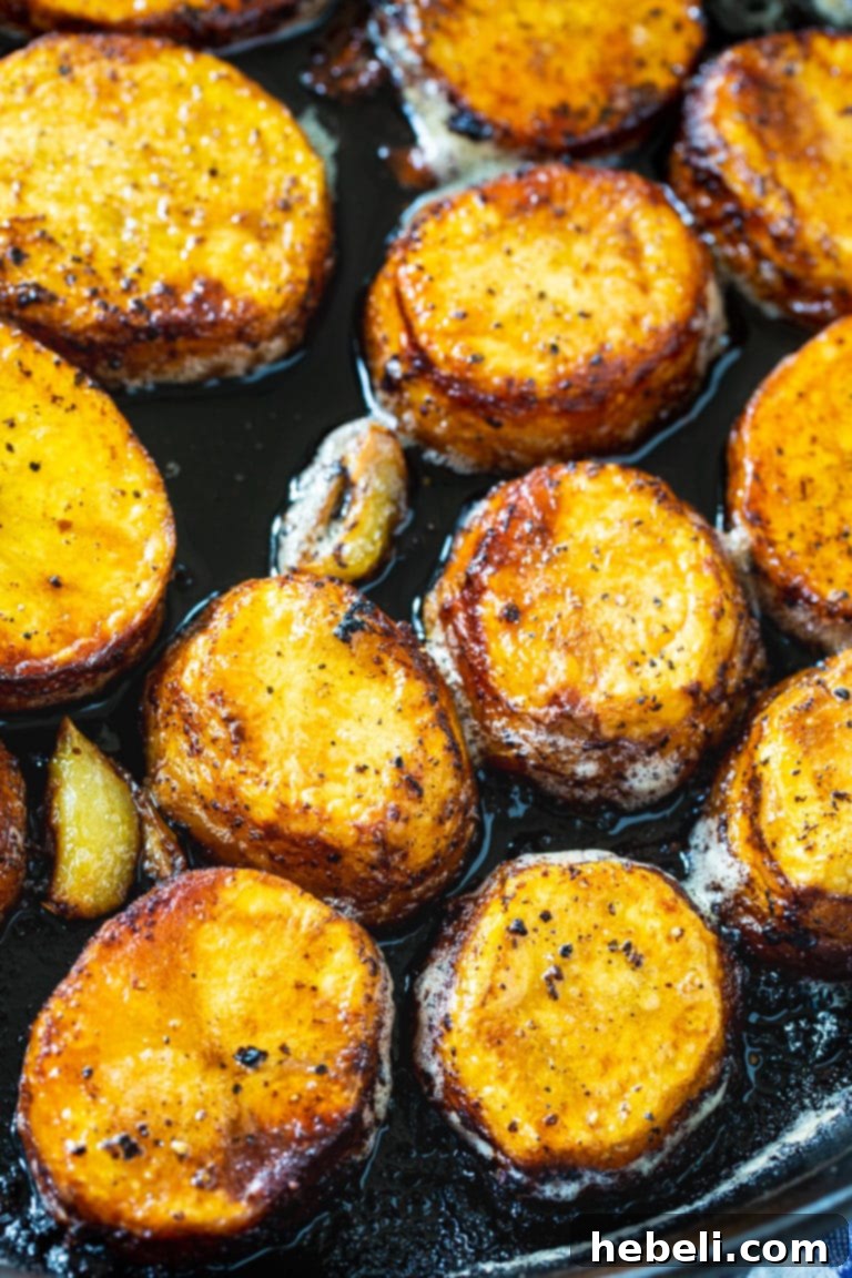 Close-up of Spicy Melting Potatoes, highlighting their beautifully browned crust.